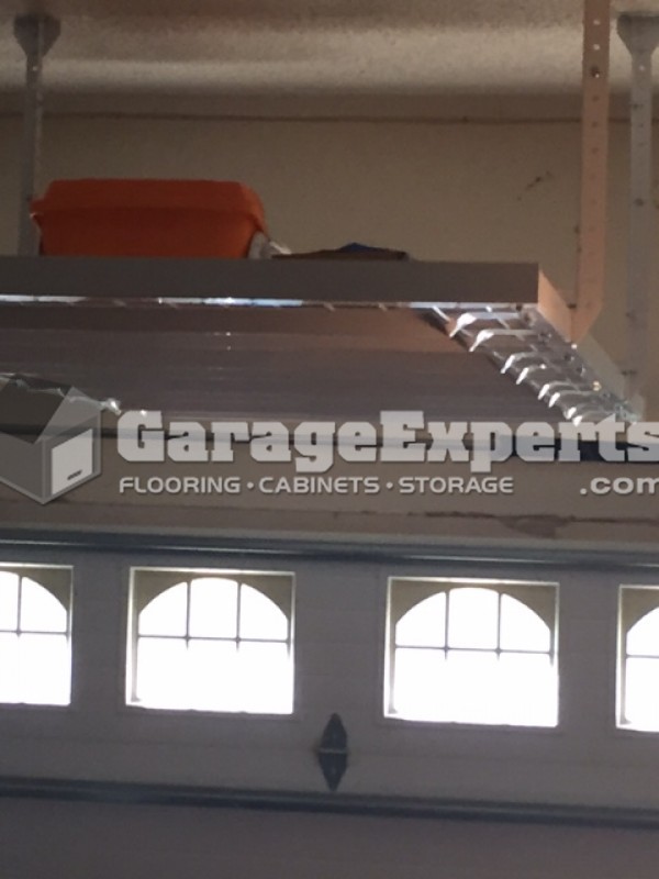 Overhead Storage Racks Can Turn The Area Above Your Garage Doors